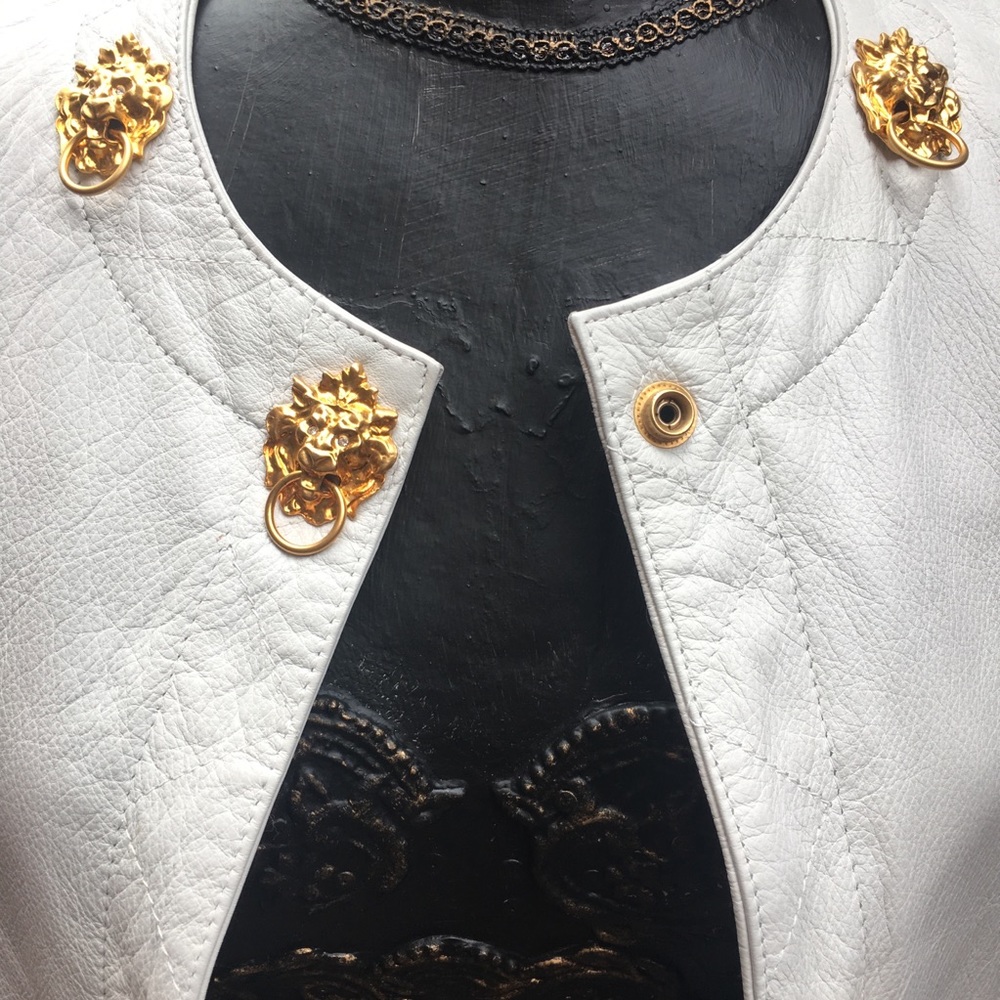 Vintage long white leather vest w lion heads
